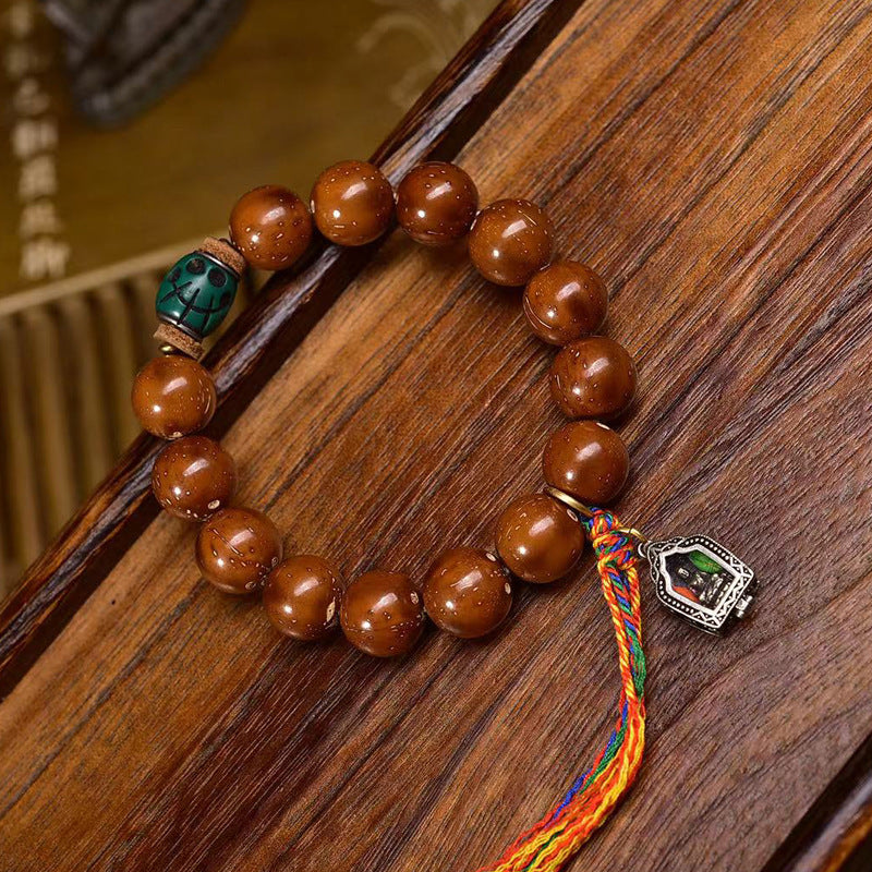 Purple - Gold Rat Three - Eyed Bodhi Seed Bracelet